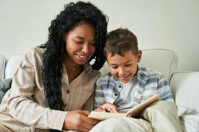 Mother reading with her son | Why Your Child's Love Language Matters