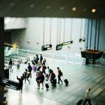 people in airport terminal | traveling alone with kids blog
