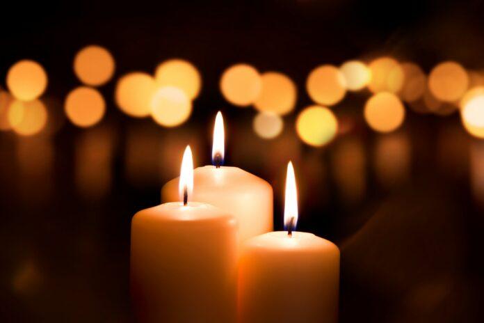 Grief and the Holidays Bokeh candle | Navigating grief and the holidays