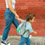 Mamá Can’t Catch Every Fall Mom and Son Walking Along Brick Wall | Between Protecting Them and Letting Them Fall | Motherhood