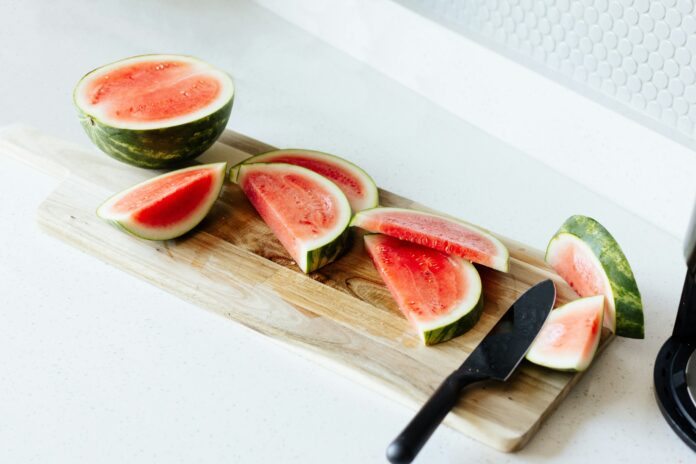 watermelon sliced on counter | 4 easy summer recipes
